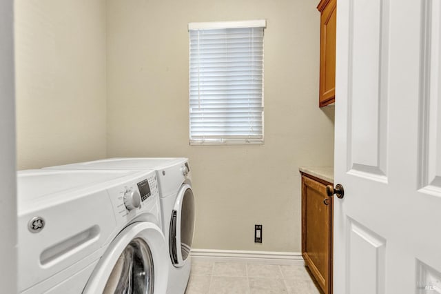 1130 W 9th St, Benicia, CA 94510 - laundry area featuring cabinet space, washer and dryer, and light tile patterned floors