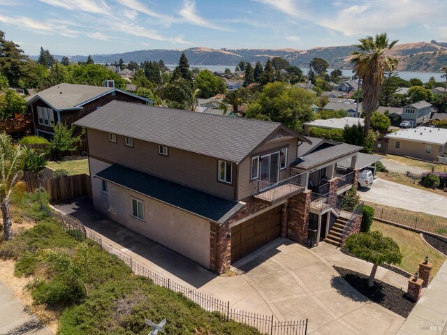 1130 W 9th St, Benicia, CA 94510 - aerial perspective of suburban area with a mountainous background