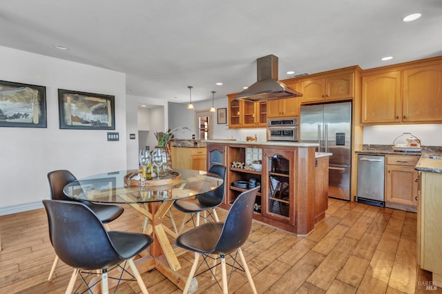 1130 W 9th St, Benicia, CA 94510 - dining space with light wood finished floors and recessed lighting