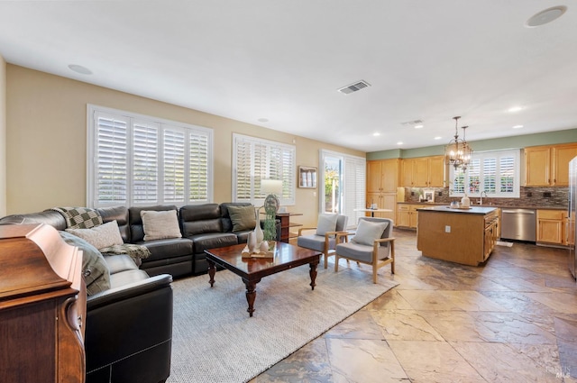 479 Jasper Ct, Benicia, CA 94510 - living room featuring plenty of natural light, recessed lighting, and a chandelier