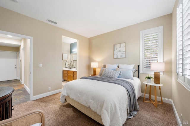 479 Jasper Ct, Benicia, CA 94510 - bedroom with light carpet and connected bathroom