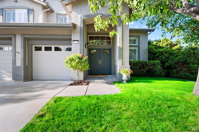 479 Jasper Ct, Benicia, CA 94510 - property entrance with a garage, stucco siding, driveway, and a lawn