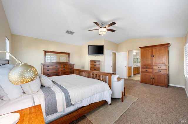 479 Jasper Ct, Benicia, CA 94510 - bedroom with vaulted ceiling, light carpet, ceiling fan, and ensuite bathroom