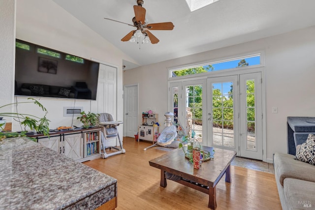 2720 Laurel St, Napa, CA 94558 - living room featuring lofted ceiling, a ceiling fan, light wood-style flooring, and french doors