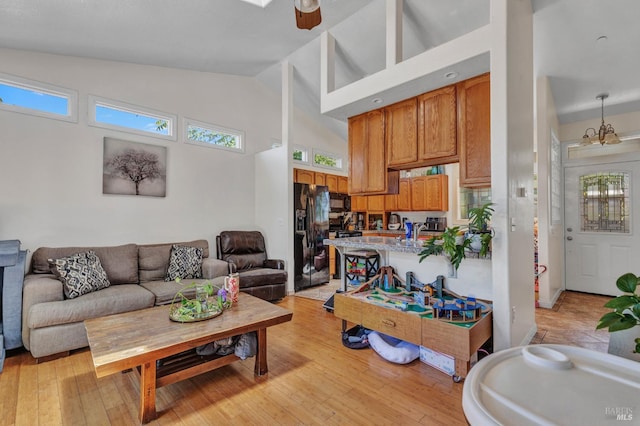 2720 Laurel St, Napa, CA 94558 - living area featuring high vaulted ceiling and light wood-style floors