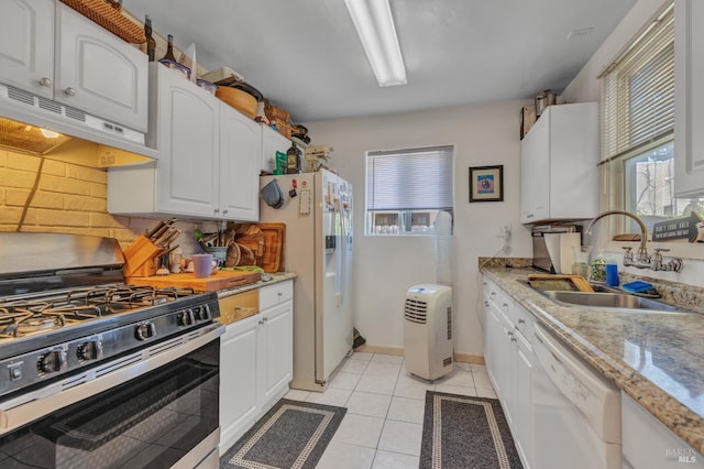 2720 Laurel St, Napa, CA 94558 - kitchen featuring white appliances, under cabinet range hood, white cabinets, and tasteful backsplash