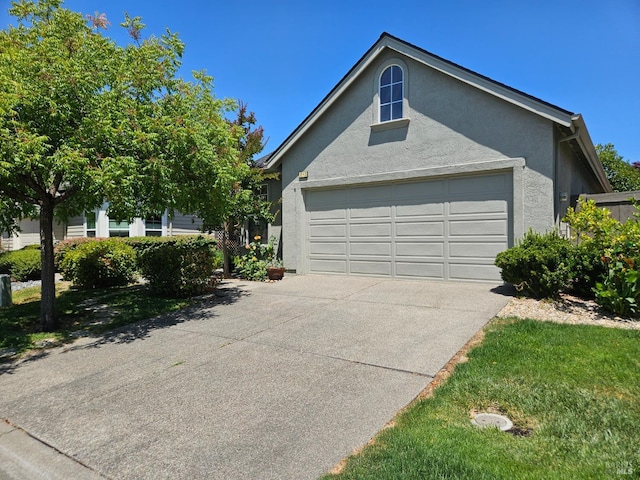 846 Glen Miller Dr, Windsor, CA 95492 - view of front facade featuring stucco siding, concrete driveway, and an attached garage