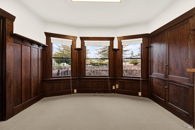 1763 2nd St, Napa, CA 94559 - unfurnished room featuring light carpet and wooden walls
