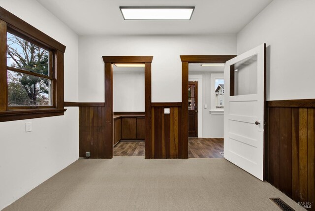 1763 2nd St, Napa, CA 94559 - carpeted empty room featuring a wainscoted wall