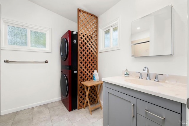 2290 Woolsey Rd, Fulton, CA 95439 - bathroom featuring stacked washer / dryer, vanity, plenty of natural light, and tile patterned floors