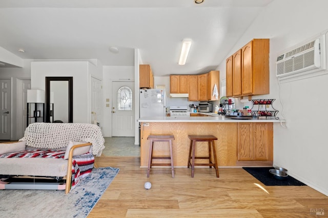 2290 Woolsey Rd, Fulton, CA 95439 - kitchen featuring white appliances, a peninsula, light countertops, light wood finished floors, and under cabinet range hood