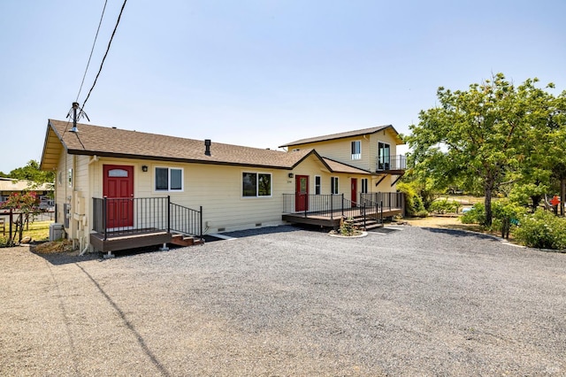 2290 Woolsey Rd, Fulton, CA 95439 - view of front facade with crawl space, a deck, and a shingled roof