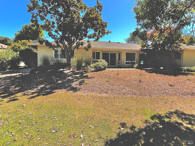 164 Oak Island Dr, Santa Rosa, CA 95409 - rear view of property featuring a lawn
