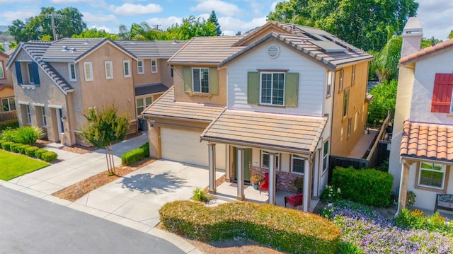 524 Chaparral Loop, Vacaville, CA 95688 - traditional-style home featuring a tile roof, covered porch, concrete driveway, and a garage