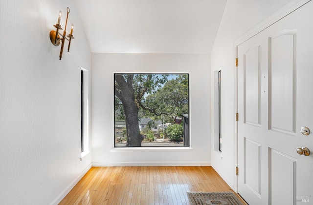 3604 Holly Ridge Dr, Santa Rosa, CA 95409 - foyer entrance with plenty of natural light, hardwood / wood-style floors, and vaulted ceiling
