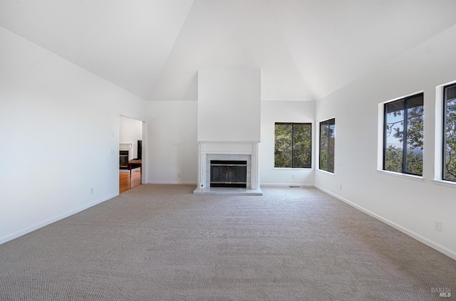 3604 Holly Ridge Dr, Santa Rosa, CA 95409 - unfurnished living room featuring high vaulted ceiling, carpet floors, and a high end fireplace