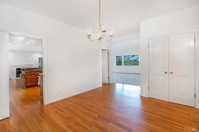 3604 Holly Ridge Dr, Santa Rosa, CA 95409 - unfurnished dining area featuring a chandelier and light wood-style floors