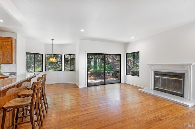 3604 Holly Ridge Dr, Santa Rosa, CA 95409 - living area with light wood-style flooring, a tile fireplace, and recessed lighting