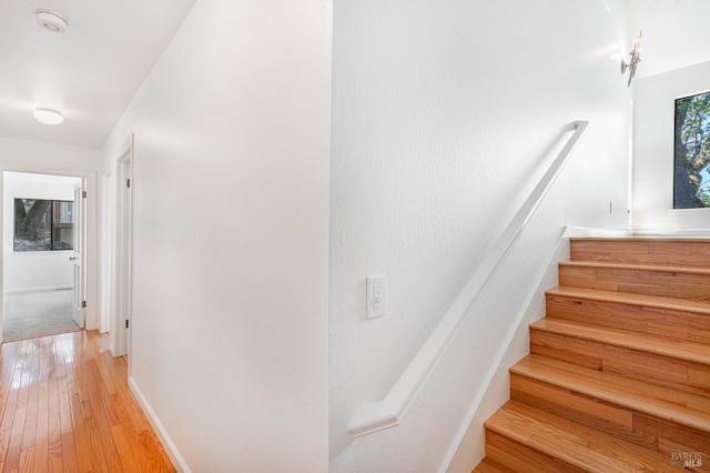 3604 Holly Ridge Dr, Santa Rosa, CA 95409 - stairs featuring wood-type flooring and baseboards