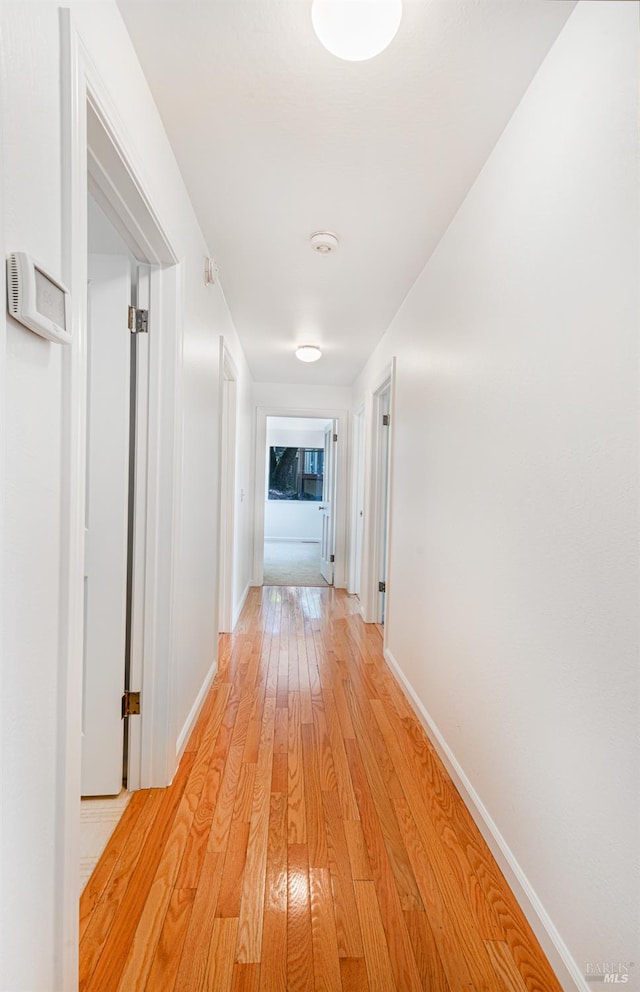 3604 Holly Ridge Dr, Santa Rosa, CA 95409 - hallway featuring light wood-type flooring and baseboards