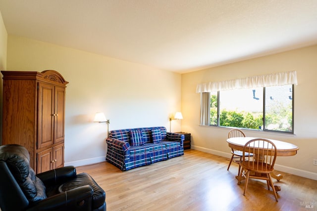 6327 Meadowridge Dr, Santa Rosa, CA 95409 - living area featuring baseboards and light wood-type flooring