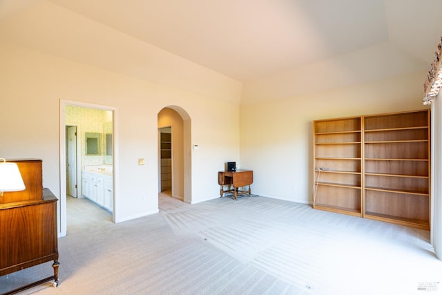 6327 Meadowridge Dr, Santa Rosa, CA 95409 - unfurnished room with arched walkways, light colored carpet, and a desk