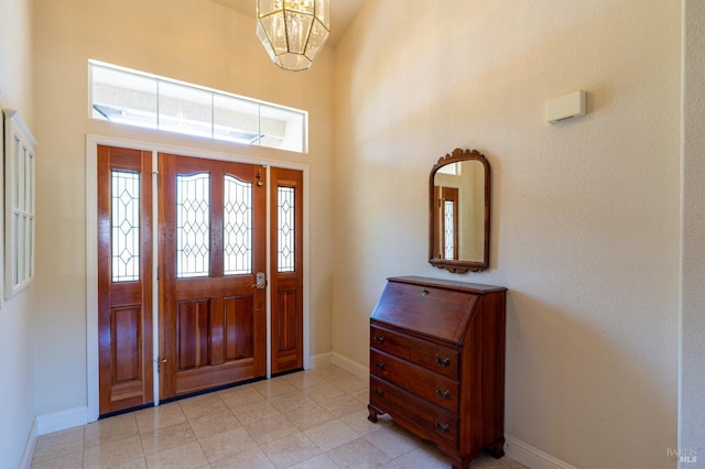 6327 Meadowridge Dr, Santa Rosa, CA 95409 - entryway featuring a high ceiling, a chandelier, and light tile patterned flooring