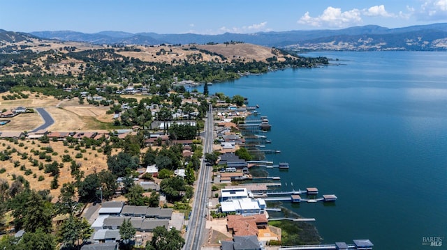 drone / aerial view of a water and mountain view