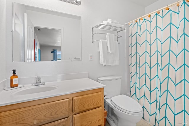 full bath with vanity and curtained shower