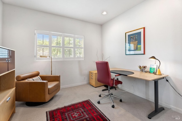 carpeted home office with healthy amount of natural light and recessed lighting