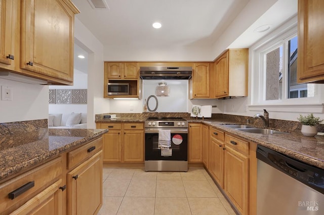 204 Foss Creek Cir Unit B, Healdsburg, CA 95448 - kitchen featuring stainless steel appliances, ventilation hood, dark stone counters, light tile patterned flooring, and recessed lighting