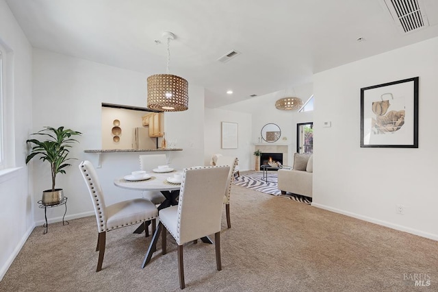 204 Foss Creek Cir Unit B, Healdsburg, CA 95448 - dining space featuring light carpet and a lit fireplace