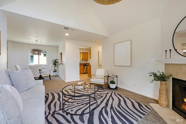 204 Foss Creek Cir Unit B, Healdsburg, CA 95448 - living room featuring light carpet, a fireplace, and lofted ceiling