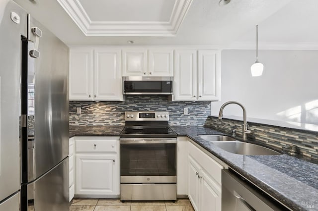 1255 Oak Ridge Ln, Pinole, CA 94564 - kitchen featuring stainless steel appliances, a tray ceiling, crown molding, white cabinetry, and backsplash