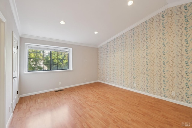 1255 Oak Ridge Ln, Pinole, CA 94564 - spare room featuring crown molding, light wood-style flooring, recessed lighting, and wallpapered walls
