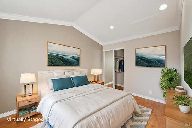 1255 Oak Ridge Ln, Pinole, CA 94564 - bedroom featuring attic access, crown molding, wood finished floors, a closet, and vaulted ceiling