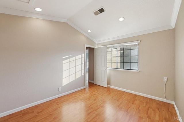1255 Oak Ridge Ln, Pinole, CA 94564 - spare room featuring crown molding, wood finished floors, vaulted ceiling, and recessed lighting