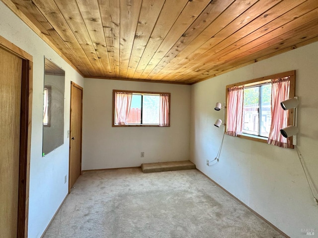 716 Mountain View Ave, Petaluma, CA 94952 - empty room featuring light colored carpet, plenty of natural light, and wood ceiling