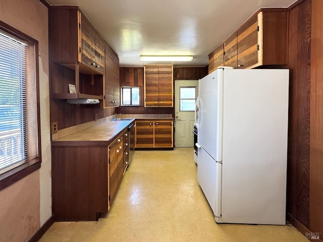 716 Mountain View Ave, Petaluma, CA 94952 - kitchen with freestanding refrigerator, tile counters, dishwasher, and open shelves