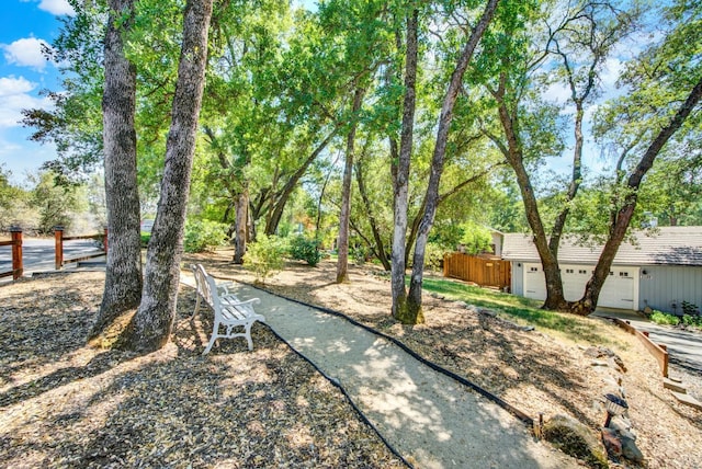 2588 King Edward Ct, El Dorado Hills, CA 95762 - view of yard with an attached garage