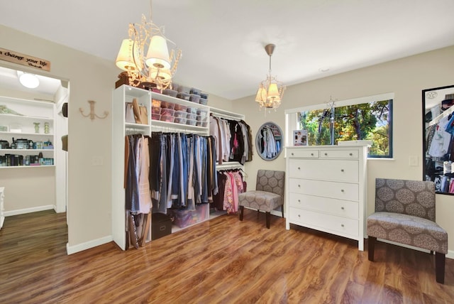 2588 King Edward Ct, El Dorado Hills, CA 95762 - walk in closet featuring a chandelier and wood finished floors