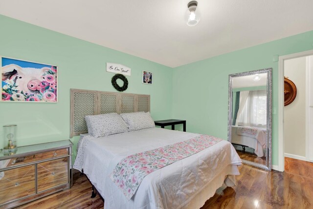 2588 King Edward Ct, El Dorado Hills, CA 95762 - bedroom featuring wood finished floors and baseboards