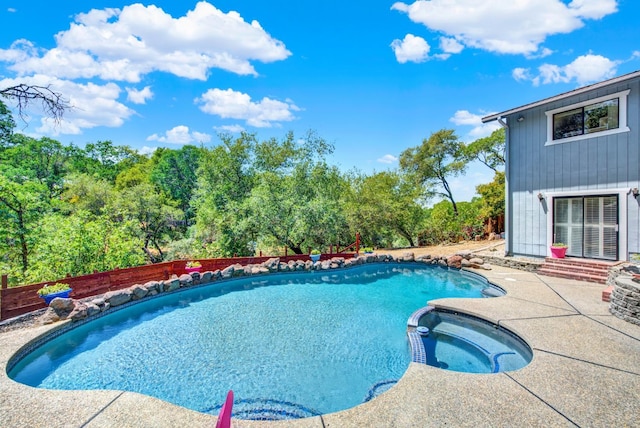 2588 King Edward Ct, El Dorado Hills, CA 95762 - view of swimming pool featuring a pool with connected hot tub and a patio area