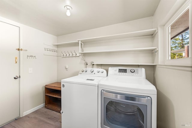 406 White Oak Dr, Santa Rosa, CA 95409 - washroom with washing machine and dryer and light wood-style floors