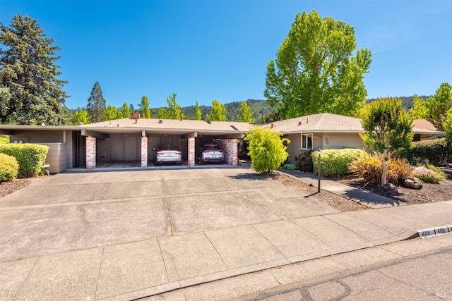 406 White Oak Dr, Santa Rosa, CA 95409 - single story home featuring covered parking and a chimney