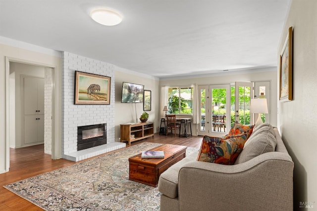 406 White Oak Dr, Santa Rosa, CA 95409 - living room with wood finished floors, a fireplace, and crown molding