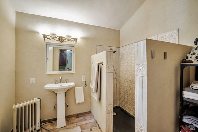 2685 Austin Creek Rd, Cazadero, CA 95421 - full bathroom featuring radiator, tiled shower, and lofted ceiling