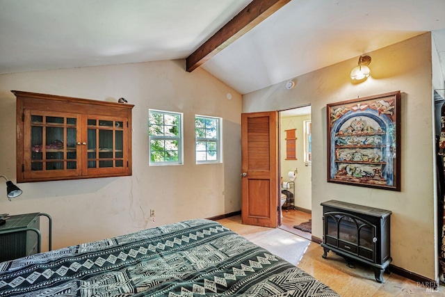2685 Austin Creek Rd, Cazadero, CA 95421 - bedroom with a wood stove and light wood-style flooring