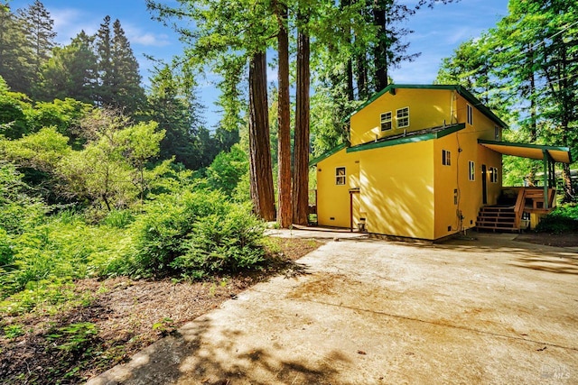 2685 Austin Creek Rd, Cazadero, CA 95421 - view of front facade featuring driveway and a deck