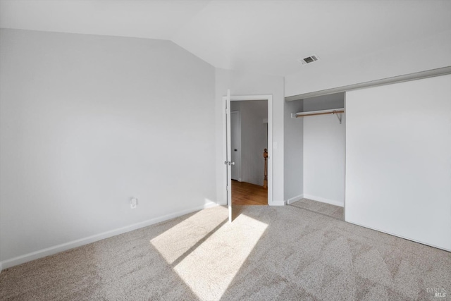 766 Calico Trl, Vacaville, CA 95687 - unfurnished bedroom featuring carpet floors, a closet, and vaulted ceiling